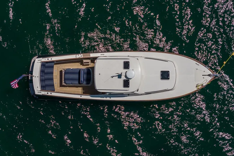 Slide: The Image of Aerial view of 2001 Hinckley Picnic Boat 36 Classic on sparkling water. - 14