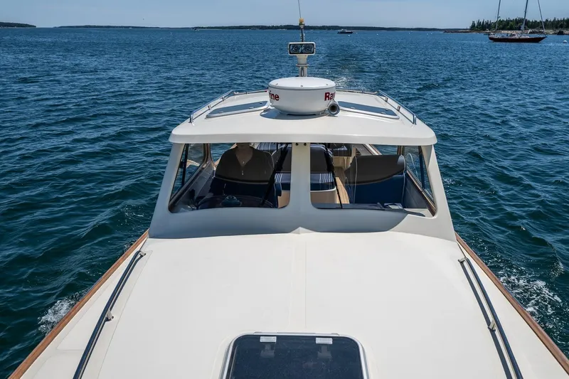 Slide: The Image of 2001 Hinckley Picnic Boat 36 Classic cruising on open water. - 15