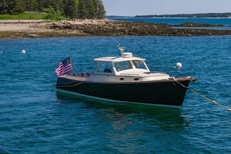 Slide: The Image of 2001 Hinckley Picnic Boat 36 Classic anchored in scenic coastal waters. - 8