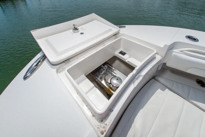 Slide: The Image of Open storage compartment on 2019 Regulator 31 boat, showcasing interior details. - 35