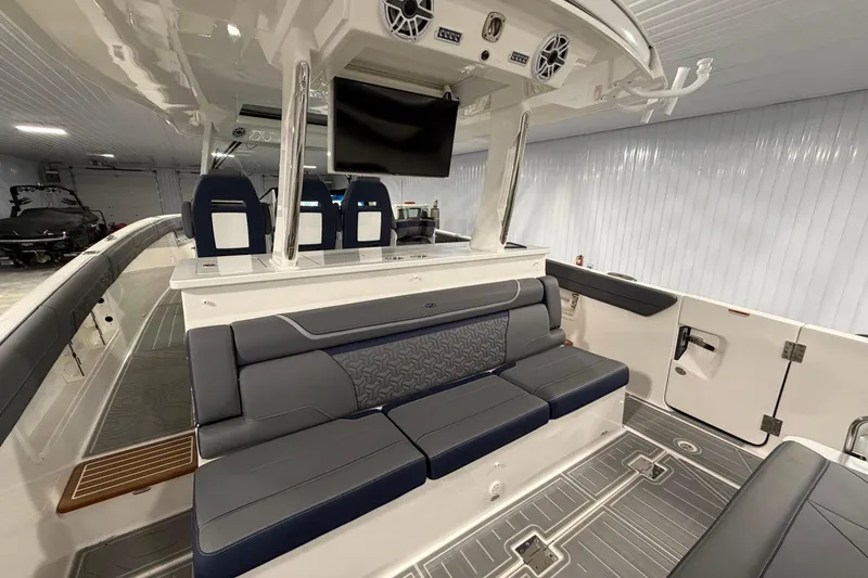 Slide: The Image of Luxurious interior of 2027 Regal 38 Surf boat with modern seating and entertainment system. - 10