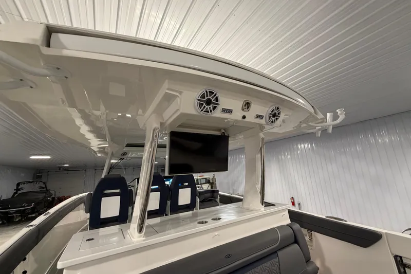 Slide: The Image of 2027 Regal 38 Surf boat interior with modern seating and entertainment system. - 11
