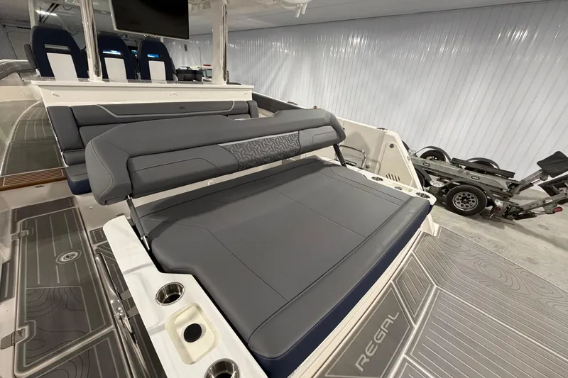 Slide: The Image of 2027 Regal 38 Surf boat interior with luxurious seating and modern design. - 13
