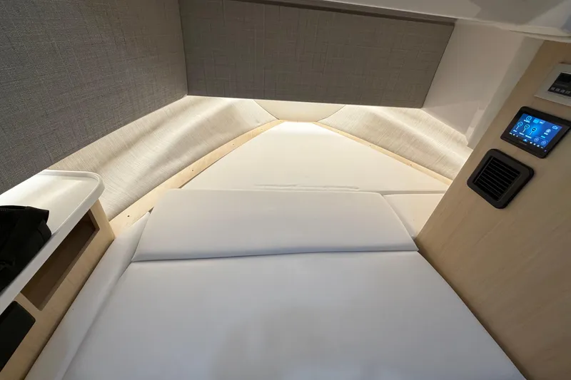 Slide: The Image of Interior cabin of 2027 Regal 38 Surf boat with modern design and control panel. - 22
