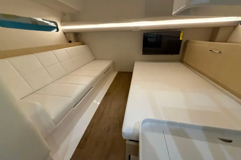 Slide: The Image of Modern interior of 2027 Regal 38 Surf boat with sleek white seating and wood accents. - 26