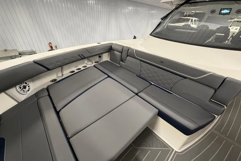 Slide: The Image of 2027 Regal 38 Surf boat interior with luxurious gray seating and modern design. - 30