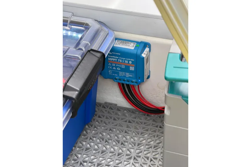 Slide: The Image of SmartSolar charge controller in 2025 Saxdor 320 GTC boat, with connected cables. - 47