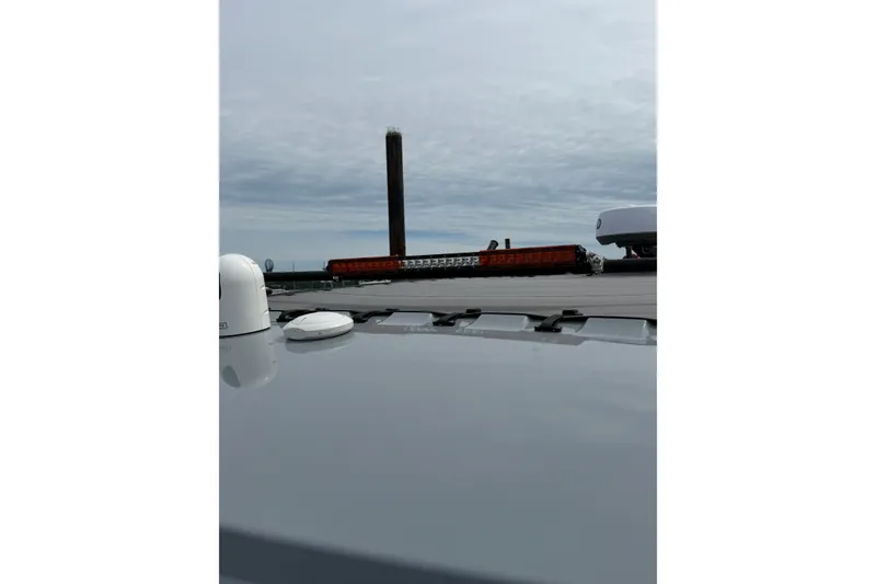 Slide: The Image of Rooftop view of 2025 Saxdor 320 GTC with overcast sky background. - 37