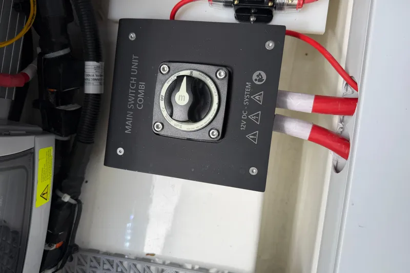 Slide: The Image of Main switch unit in Saxdor 320 GTC 2025, featuring 12V DC system wiring. - 42
