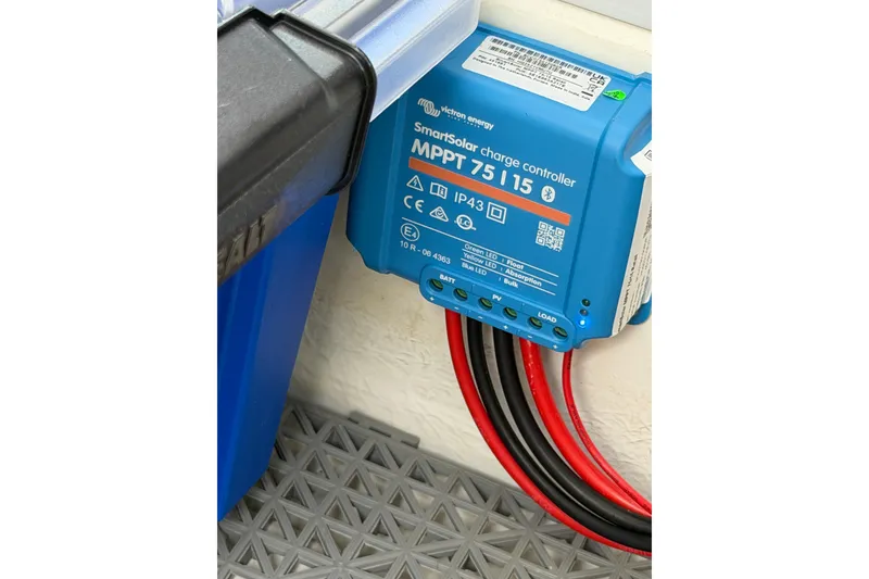 Slide: The Image of SmartSolar charge controller MPPT 75/15 installed on Saxdor 320 GTC, 2025 model. - 49