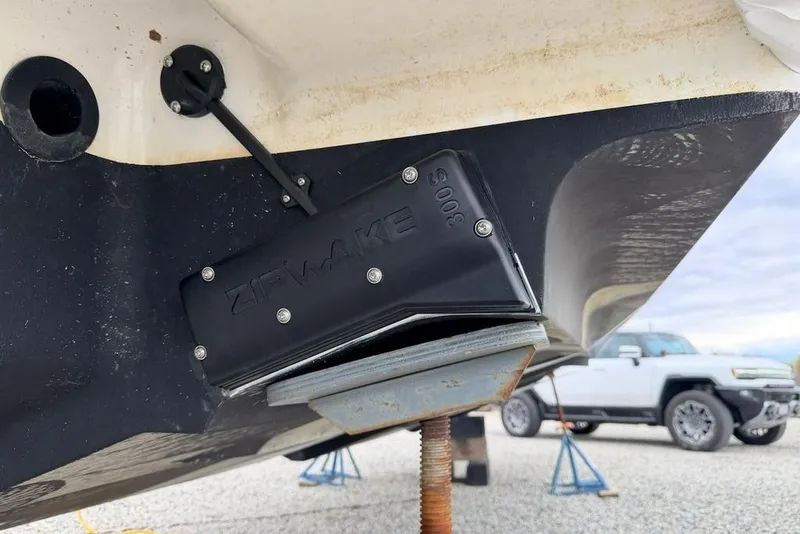 Slide: The Image of Close-up of Zipwake interceptor on 2025 Saxdor 320 GTC boat hull. - 53