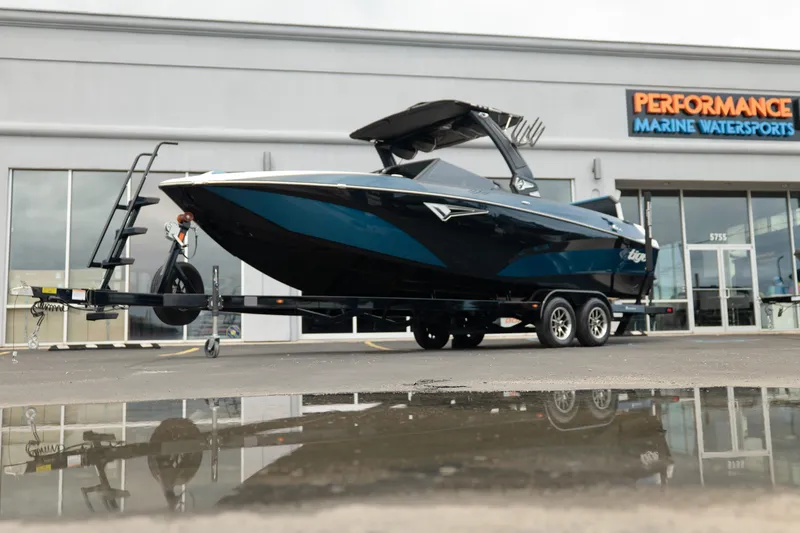 The Image of 2024 Tigé Z5 boat on trailer at Performance Marine Watersports dealership. - 1