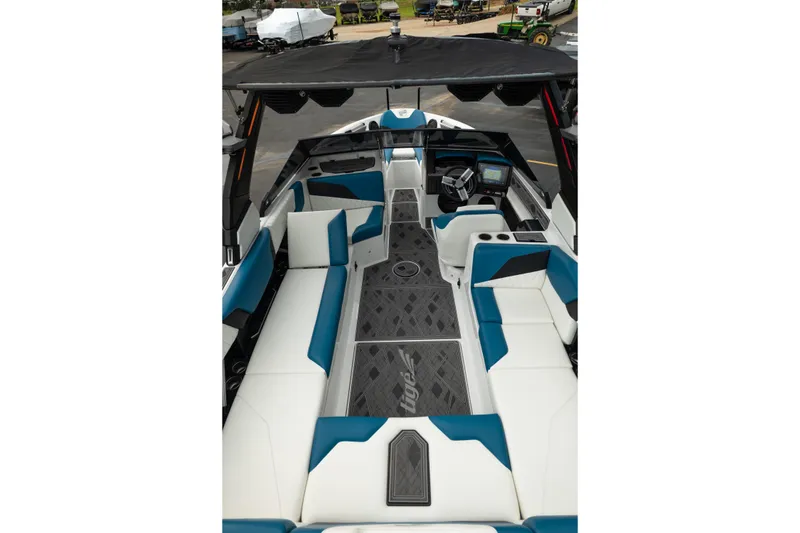 Slide: The Image of 2024 Tigé Z5 boat interior with modern seating and advanced dashboard features. - 17