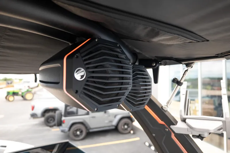 Slide: The Image of 2024 Tigé Z5 boat speakers mounted under a canopy, showcasing sleek design and functionality. - 21