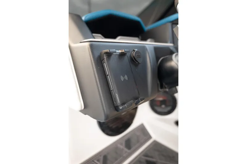 Slide: The Image of 2024 Tigé Z5 dashboard with wireless charging pad and control panel. - 29