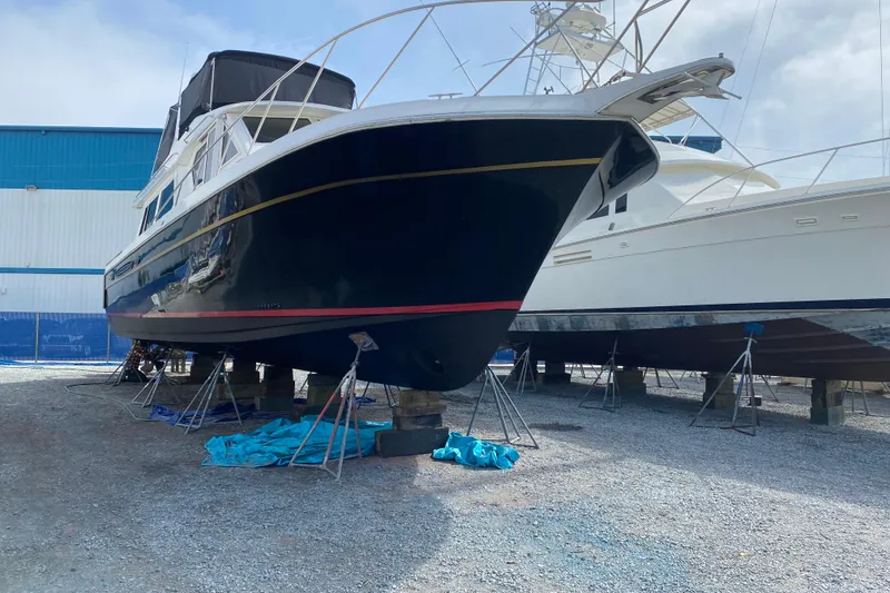 Slide: The Image of 2001 Navigator Yacht 5600 Pilothouse Classic on dry dock, ready for maintenance. - 3