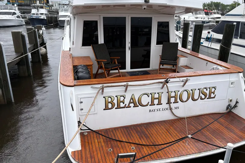 Slide: The Image of 2001 Navigator Yacht 5600 Pilothouse Classic named "Beach House" docked at marina. - 33