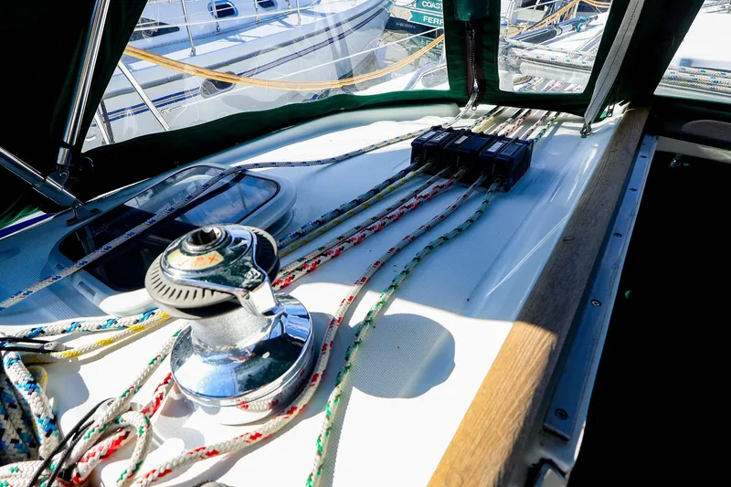 Slide: The Image of Deck view of 2002 Beneteau Oceanis Clipper 361 sailboat with winch and ropes. - 23