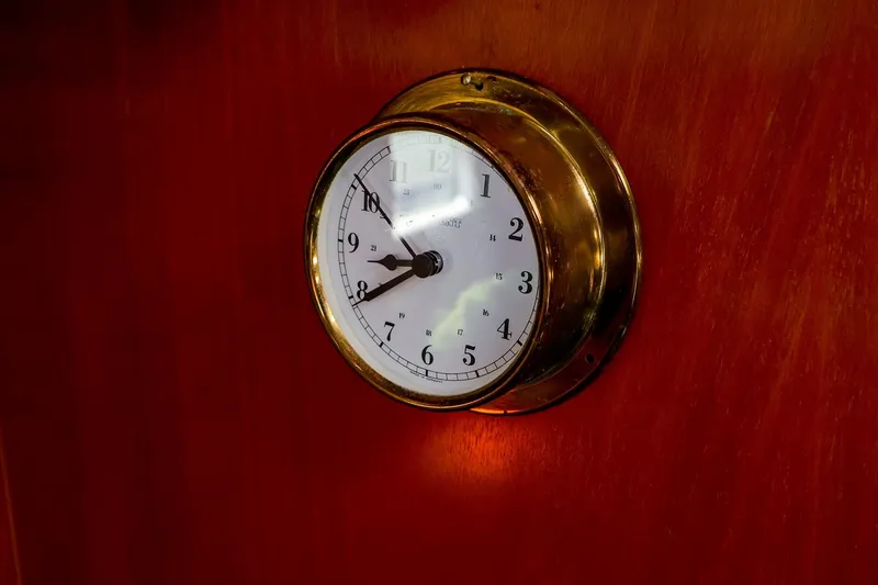 Slide: The Image of Brass clock on Beneteau Oceanis Clipper 361 yacht, 2002 model, mounted on wooden panel. - 58