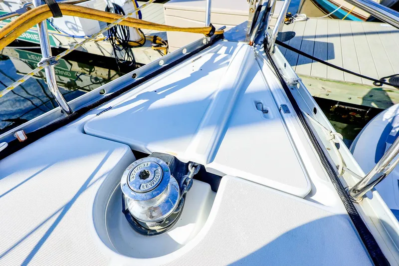 Slide: The Image of Deck of 2002 Beneteau Oceanis Clipper 361 sailboat with winch and railing. - 29