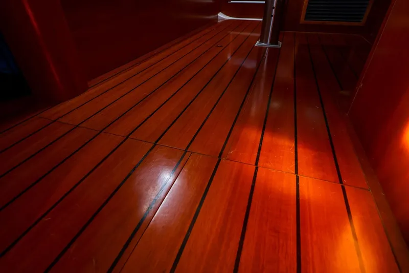 Slide: The Image of Polished wooden floor of 2002 Beneteau Oceanis Clipper 361 yacht interior. - 60