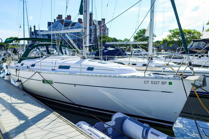 The Image of 2002 Beneteau Oceanis Clipper 361 sailboat docked at marina, sunny day. - 0