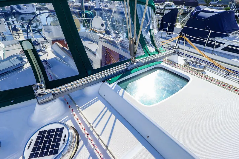 Slide: The Image of 2002 Beneteau Oceanis Clipper 361 yacht deck with solar panel and rigging details. - 6