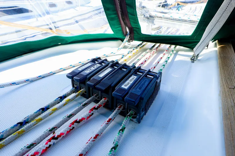 Slide: The Image of Rope clutches on a 2002 Beneteau Oceanis Clipper 361 sailboat deck. - 21