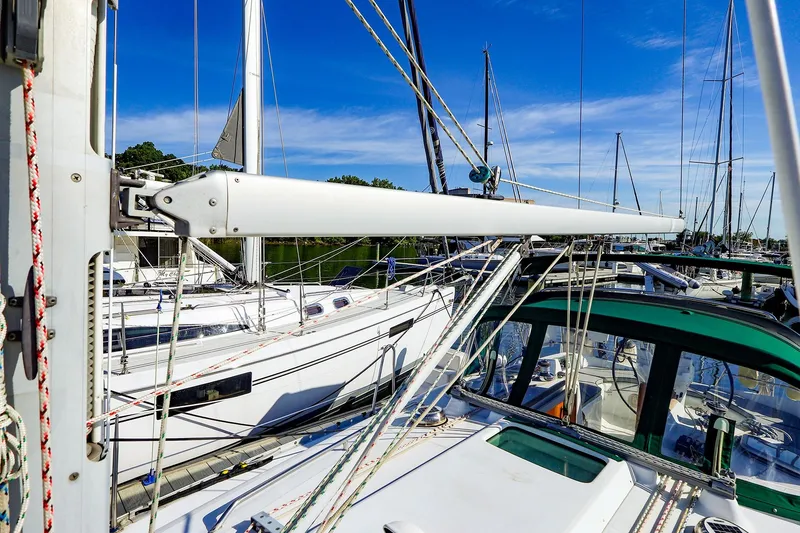 Slide: The Image of 2002 Beneteau Oceanis Clipper 361 sailboat with rigging and deck details in marina. - 28