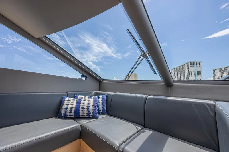 Slide: The Image of Luxurious interior of 2017 Sunseeker 75 Yacht with panoramic windows and plush seating. - 35
