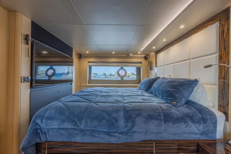 Slide: The Image of Luxurious bedroom interior of 2017 Sunseeker 75 Yacht with plush bedding and modern design. - 41