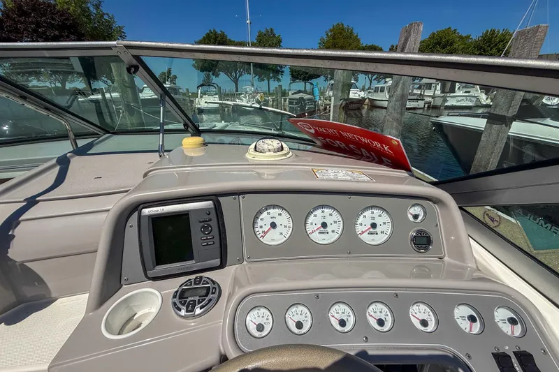 Slide: The Image of Dashboard of a 2001 Formula 280 Sun Sport boat with gauges and navigation system. - 13