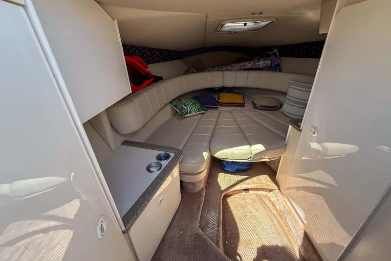 Slide: The Image of Interior cabin of a 2001 Formula 280 Sun Sport boat with seating and storage. - 14
