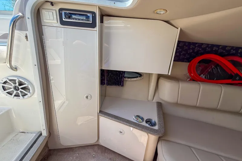 Slide: The Image of Interior of a 2001 Formula 280 Sun Sport boat with seating and storage. - 15