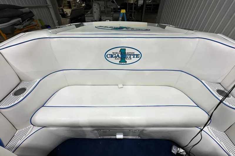 Slide: The Image of Interior seating of a 2000 Cigarette 42' Tiger boat with logo detailing. - 14