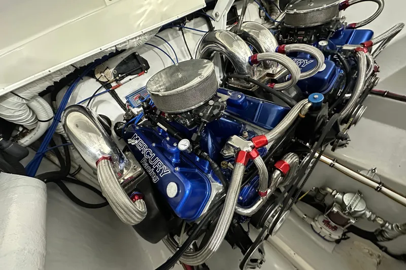 Slide: The Image of Engine compartment of a 2000 Cigarette 42' Tiger with Mercury Racing engines. - 24