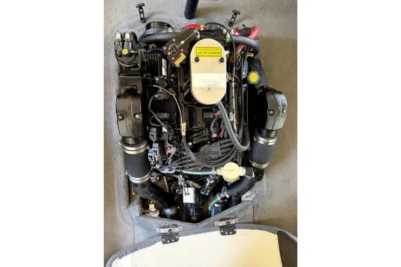 Slide: The Image of Engine of a 2005 Nautique Air Nautique 206 boat, showcasing intricate components. - 4