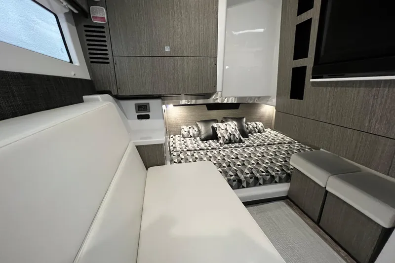 Slide: The Image of Luxurious interior of 2023 Monterey 378SS Super Sport boat with modern design and comfortable seating. - 24