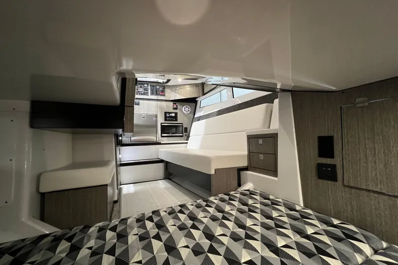 Slide: The Image of Interior of 2023 Monterey 378SS Super Sport boat, featuring modern seating and sleek design. - 31