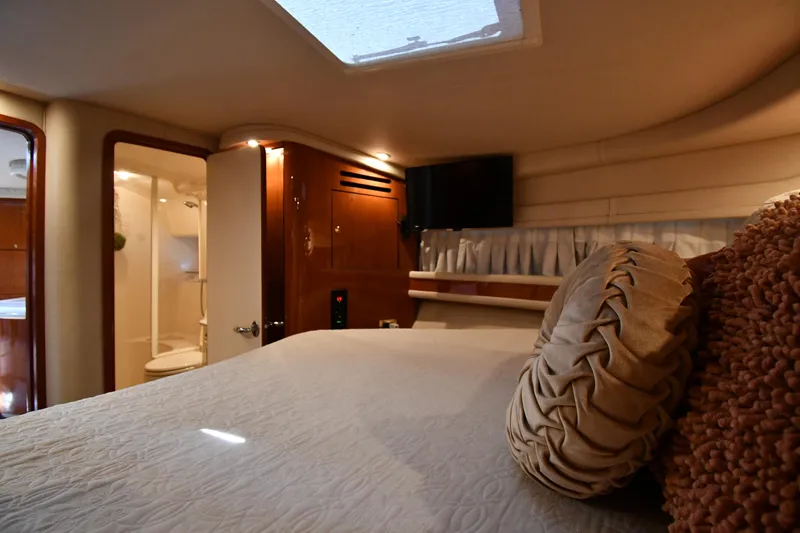 Slide: The Image of Interior of a 2000 Sea Ray Sundancer 460 with cozy bedroom and bathroom. - 39