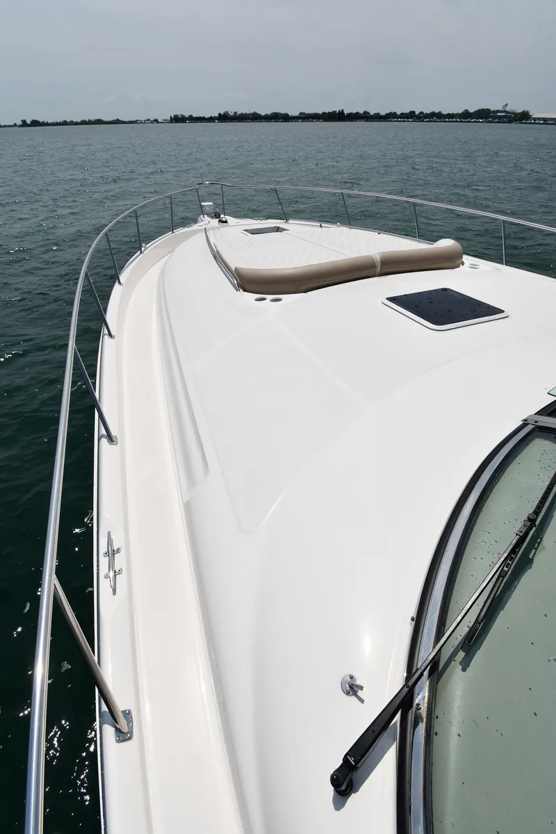 Slide: The Image of Sea Ray Sundancer 460 from 2000 on calm water. - 8