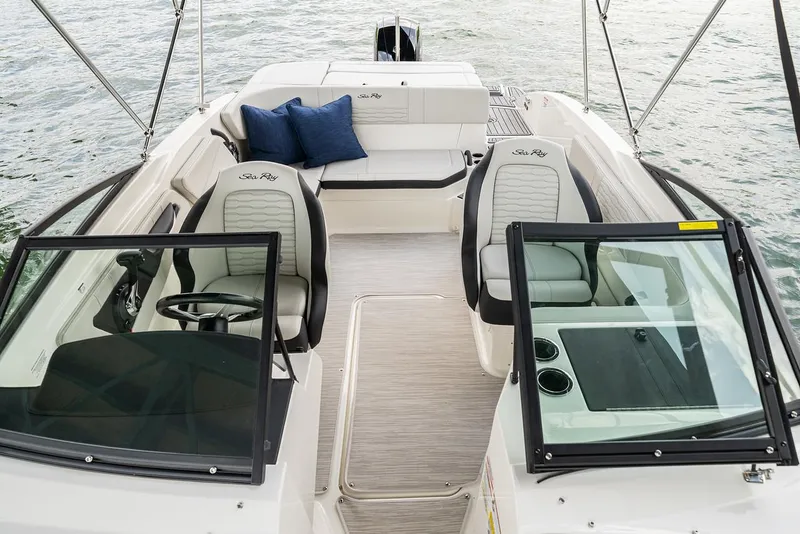 Slide: The Image of Manufacturer Provided Image: 2023 Sea Ray SPX 210 OB boat interior with seating and steering wheel. - 11