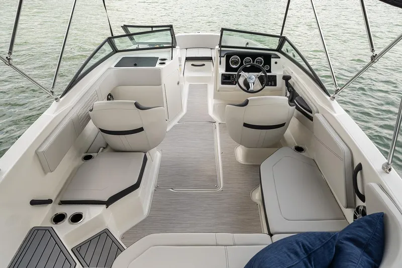 Slide: The Image of Manufacturer Provided Image: 2023 Sea Ray SPX 210 OB boat interior with seating and steering console. - 14