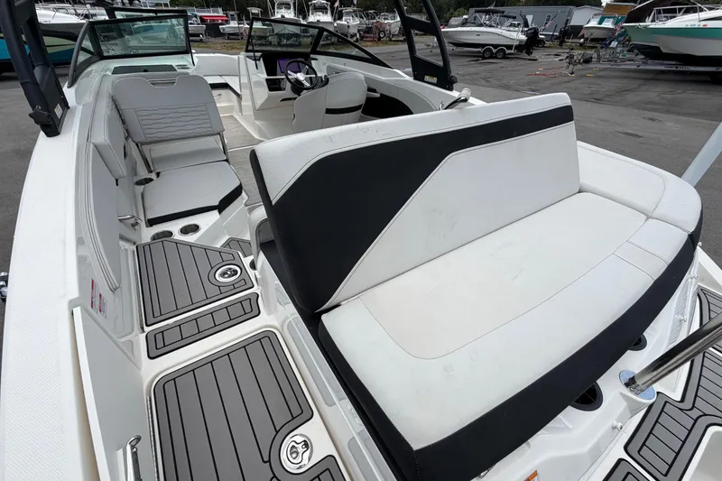 Slide: The Image of 2023 Sea Ray SPX 210 Outboard boat interior with sleek seating and modern design. - 62