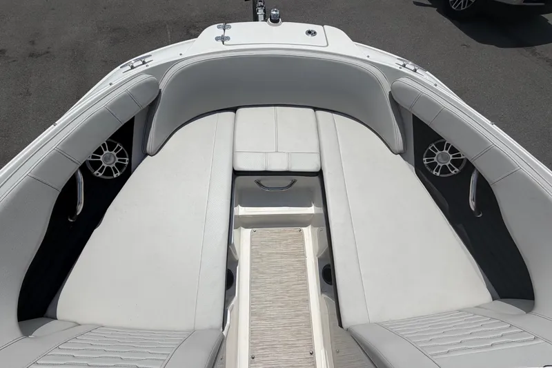Slide: The Image of 2023 Sea Ray SPX 210 Outboard with gray upholstery and speakers in the bow area. - 28