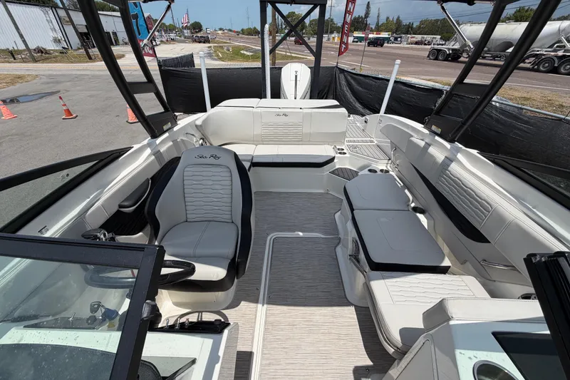 Slide: The Image of 2023 Sea Ray SPX 210 Outboard boat interior with sleek seating and modern design. - 39