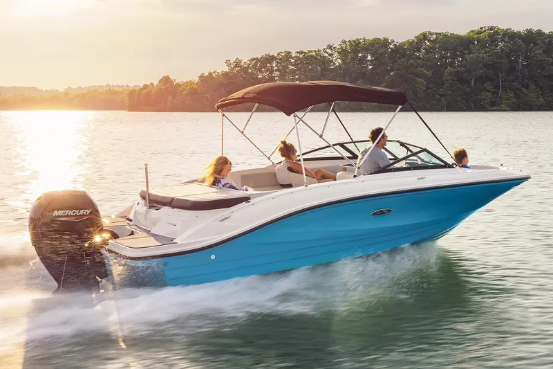 Slide: The Image of Manufacturer Provided Image: 2023 Sea Ray SPX 210 OB boat cruising on a lake at sunset. - 8