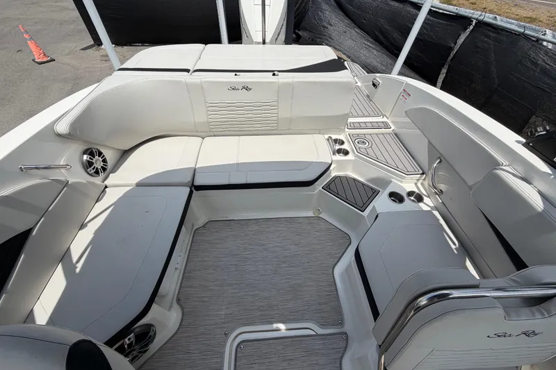 Slide: The Image of 2023 Sea Ray SPX 210 Outboard boat interior with spacious seating and modern design. - 45