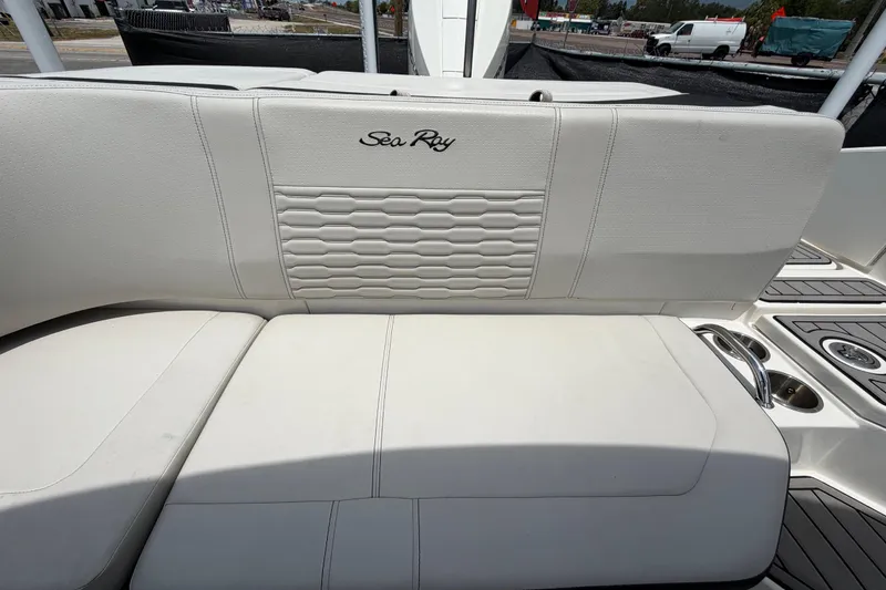 Slide: The Image of 2023 Sea Ray SPX 210 Outboard boat seat with elegant stitching and cup holders. - 53