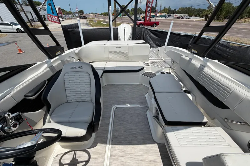 Slide: The Image of 2023 Sea Ray SPX 210 Outboard boat interior with sleek seating and modern design. - 40